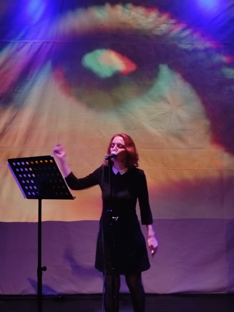 a Multimedia Spoken word Performance