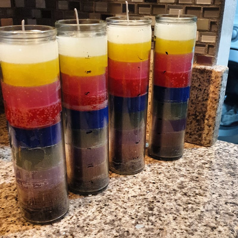 Multi coloured layered candles