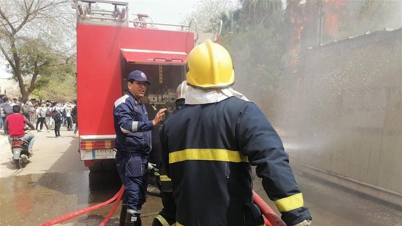 الدفاع المدني تنقذ 12 عاملاً وتخمد حريقاً داخل بناية في الأعظمية