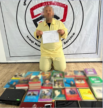 ضبط مكتبة تروج للنظام البائد وسط بغداد واعتقال صاحبها وآخر يمجد به