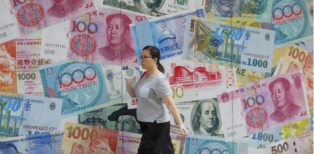 تداول الدولار الأمريكي في نطاق ضيق ترقباً لقرار مجلس الاحتياطي الاتحادي