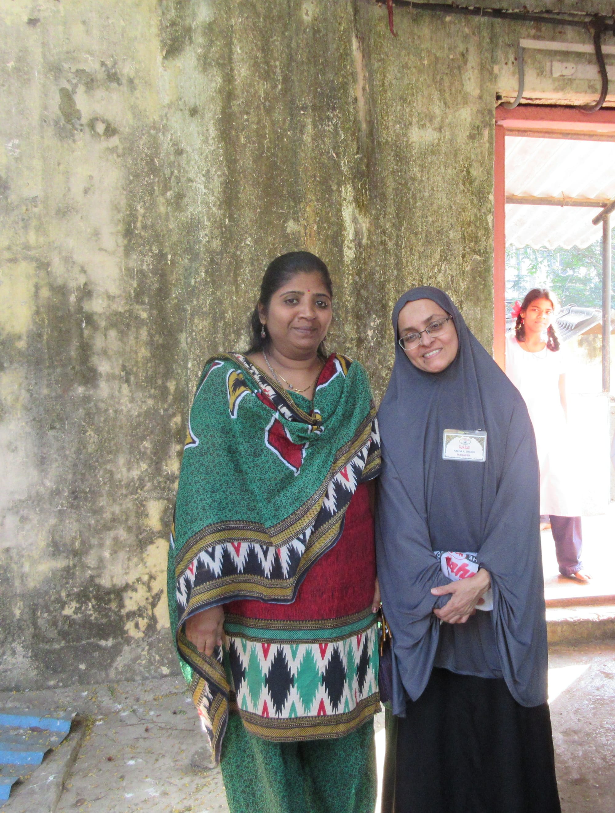 Ustaza Nafisa with a Remand Home staff