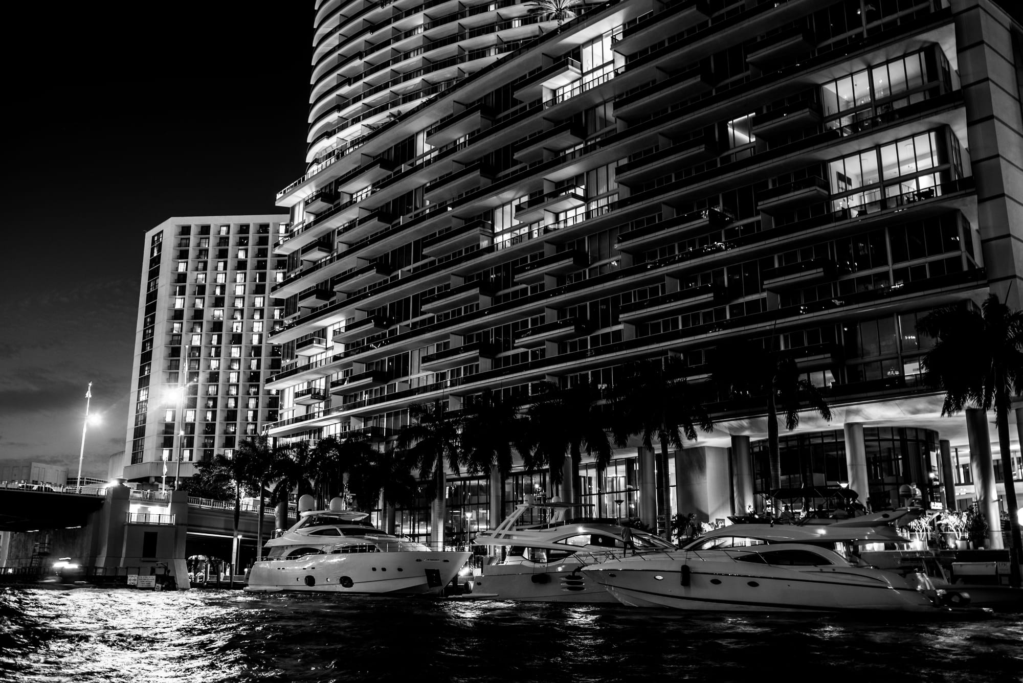 BRICKELL AVENUE IN DOWNTOWN MIAMI, FL BY NIGHT / B&W