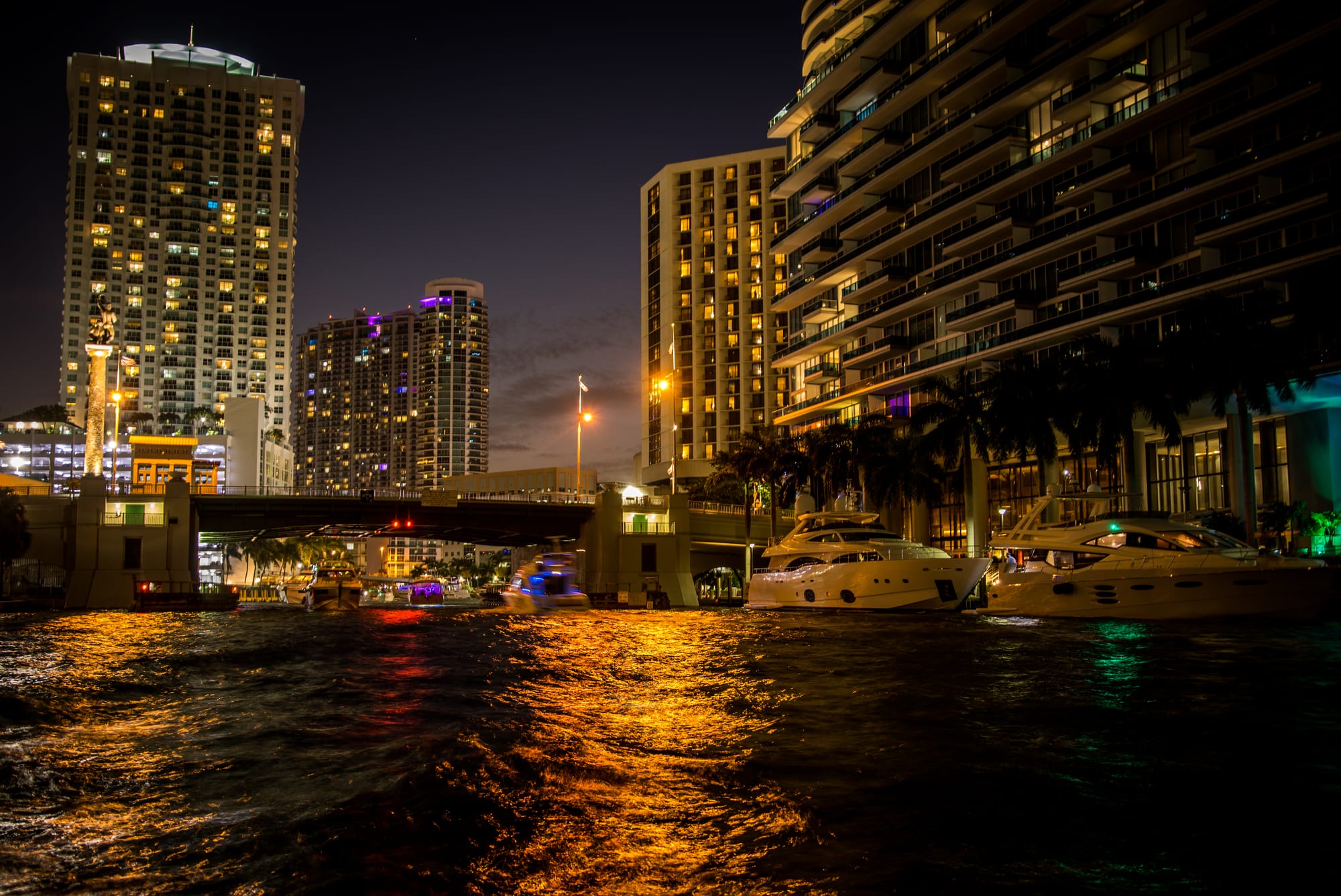 BRICKELL AVENUE BRIDGE IN DOWNTOWN MIAMI, FL BY NIGHT