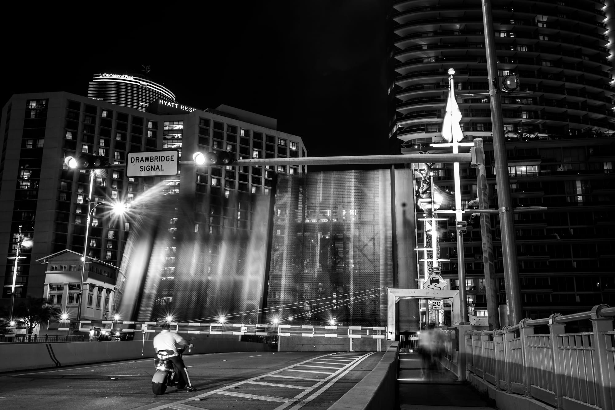 BRICKELL AVENUE BRIDGE IN DOWNTOWN MIAMI, FL BY NIGHT / B&W