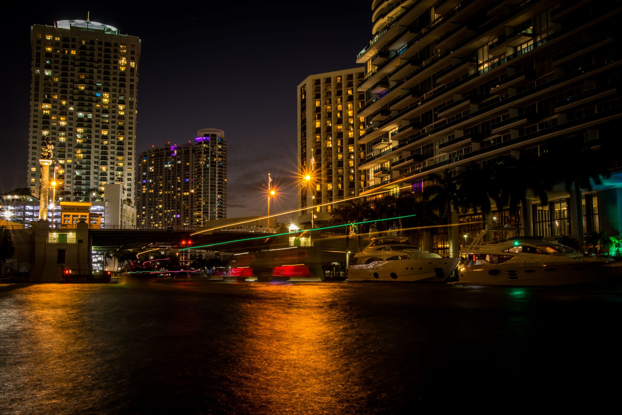 BRICKELL AVENUE BRIDGE IN DOWNTOWN MIAMI, FL BY NIGHT