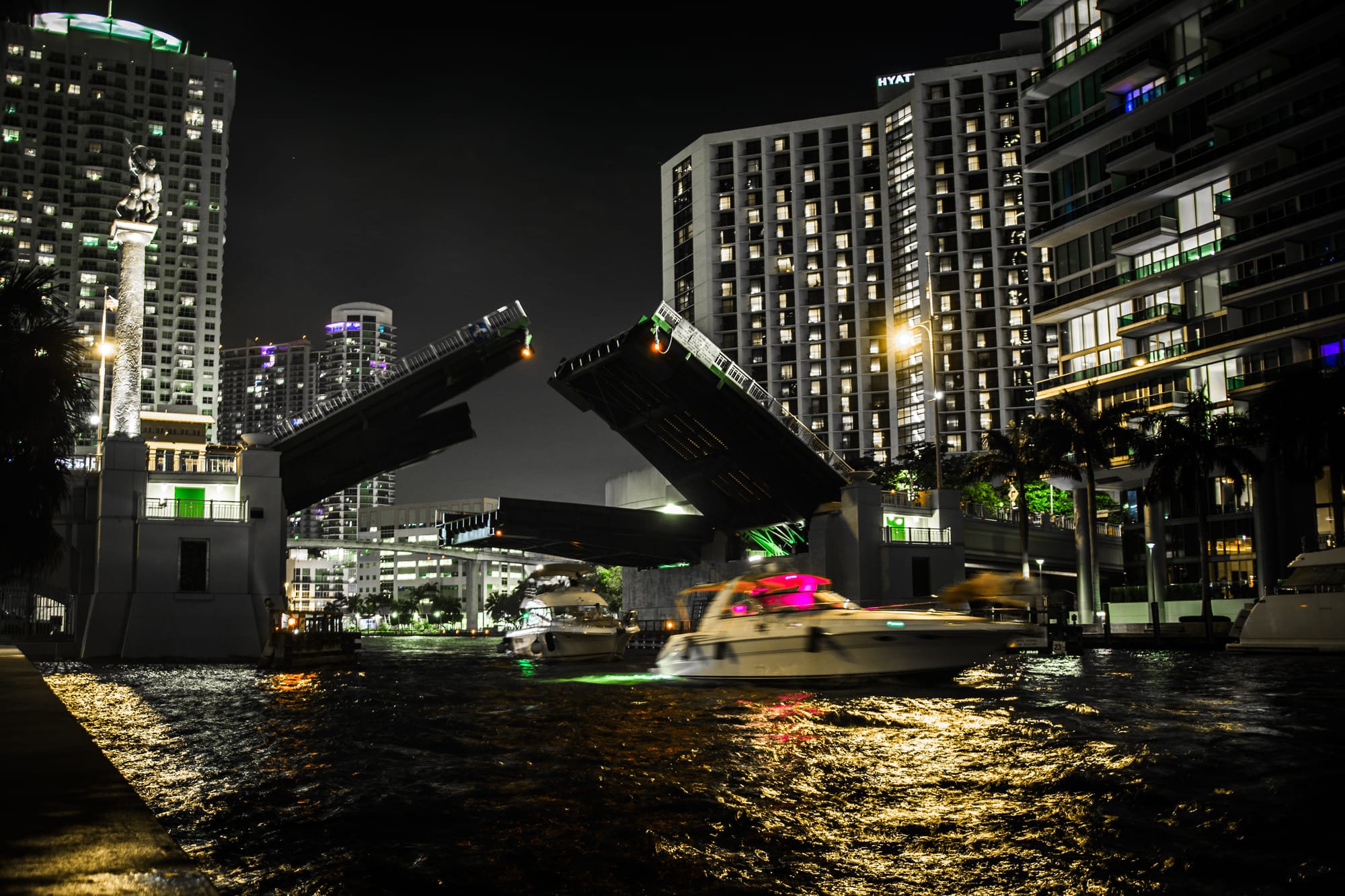 BRICKELL AVENUE BRIDGE IN DOWNTOWN MIAMI, FL BY NIGHT