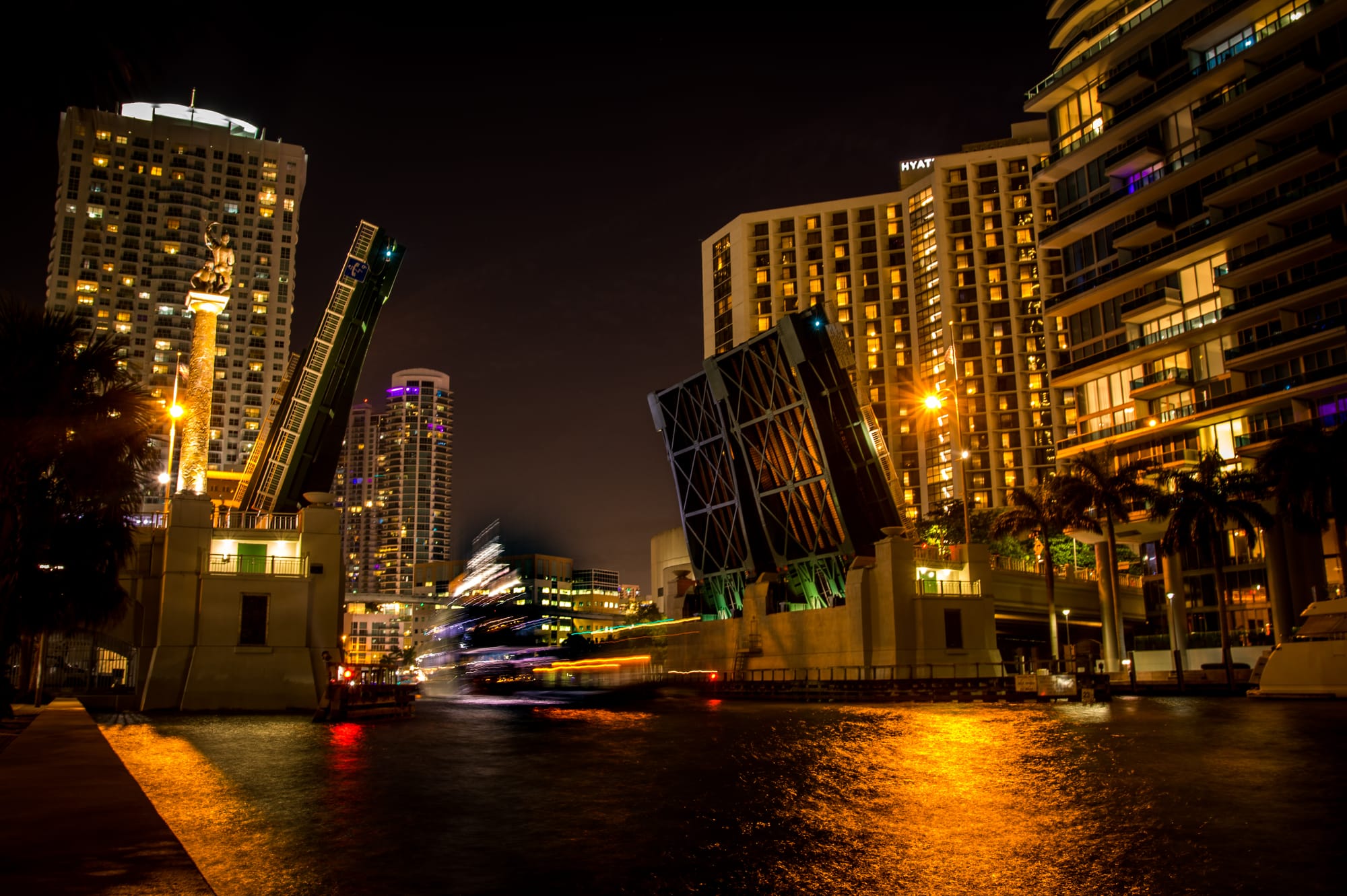 BRICKELL AVENUE BRIDGE IN DOWNTOWN MIAMI, FL BY NIGHT