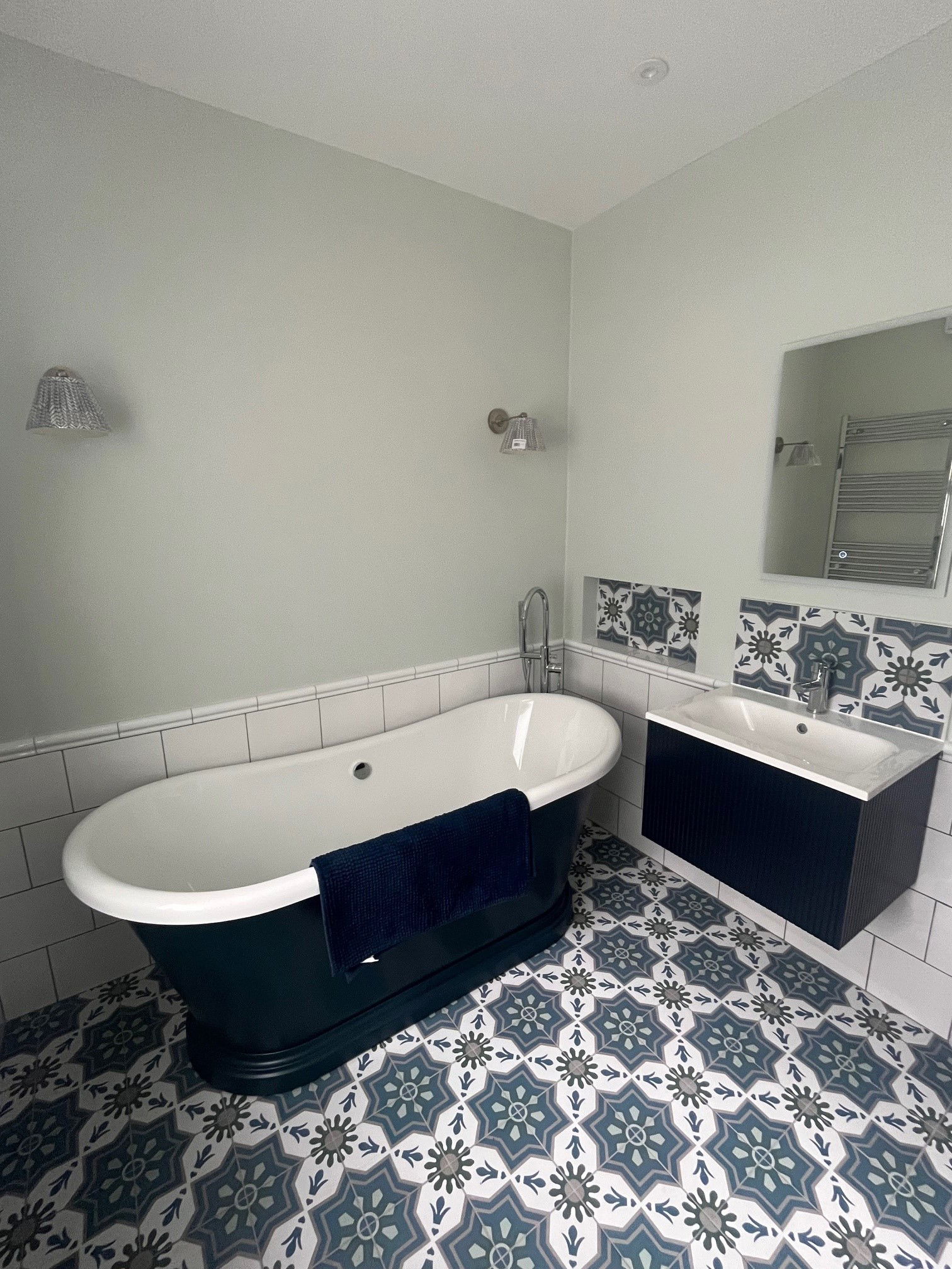 Stnad alone bath and floor mounted taps in this bathroom completed as part of a refurb project in SW18