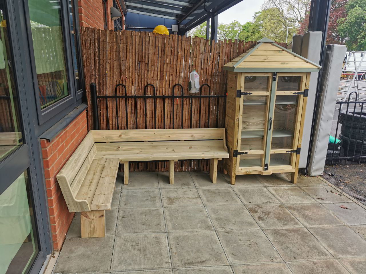 Outside library with the bench