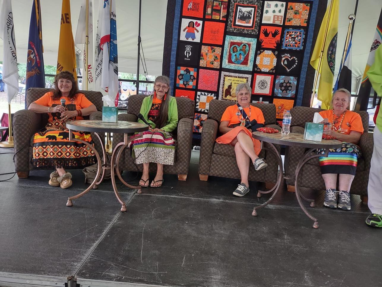 Holy Childhood Survivors at Mt. Pleasant Boarding School donning their survivor quilts and sharing their stories of survival during their time at boarding school.