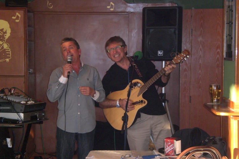 Guitar Vocals and Harmonicas