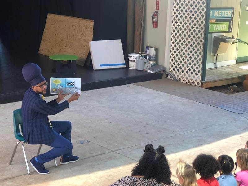 Senator Bolques reads to Montessori School Elementary students