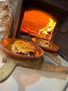 Francesinha em forno a lenha com batata