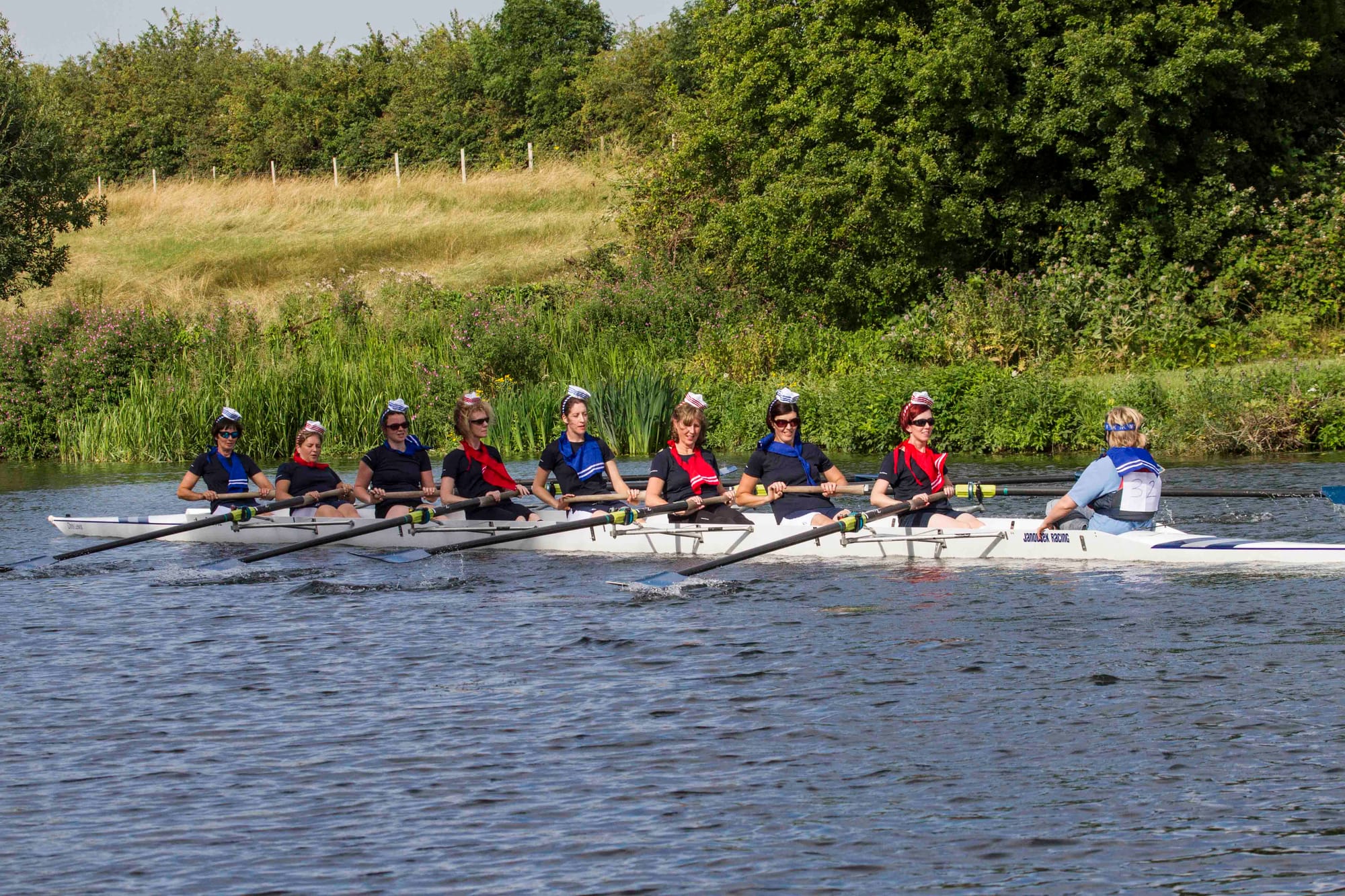 Rowing down river ready to join a race