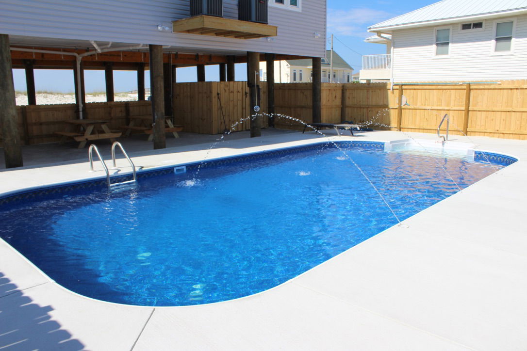 Gather here - shaded patio, grill, games, and pool