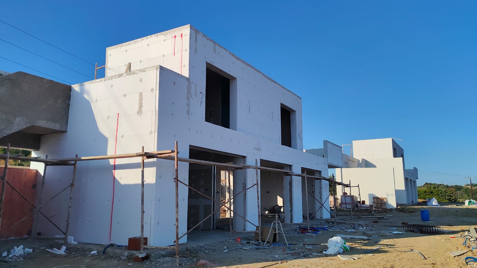 Construction of a two 2-store houses in Mastichari area with pools