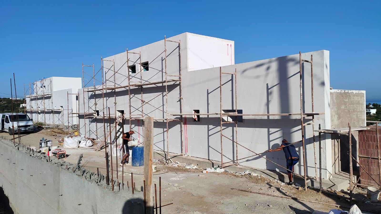 Construction of a two 2-store houses in Mastichari area with pools