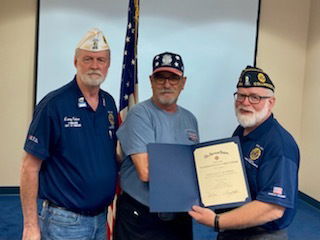 Marc Mathes receiving Diploma