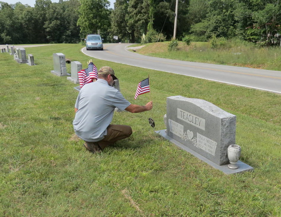 David Zeveney placing Flag