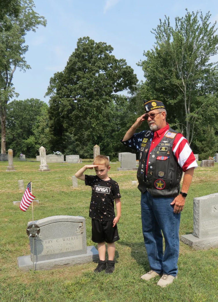 Marc Mathes and Grandson Saluting