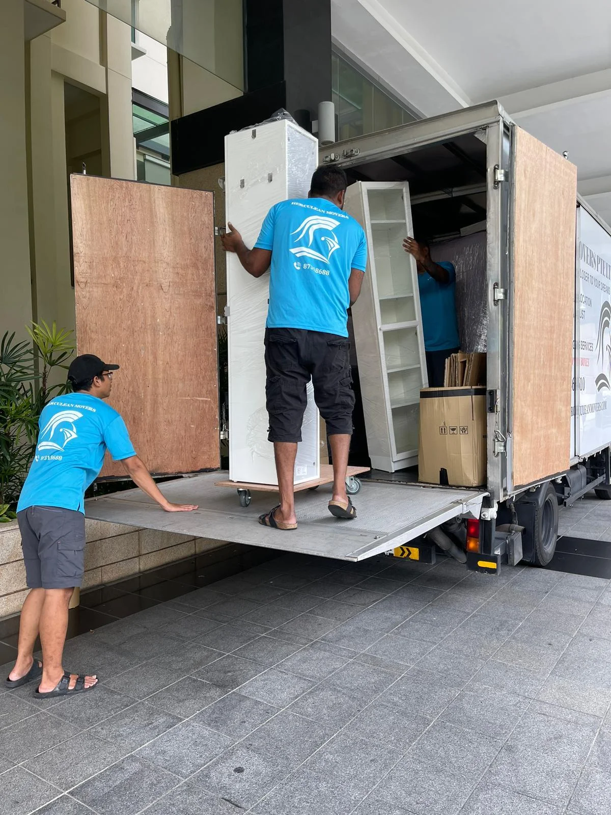 moving household shelves into truck