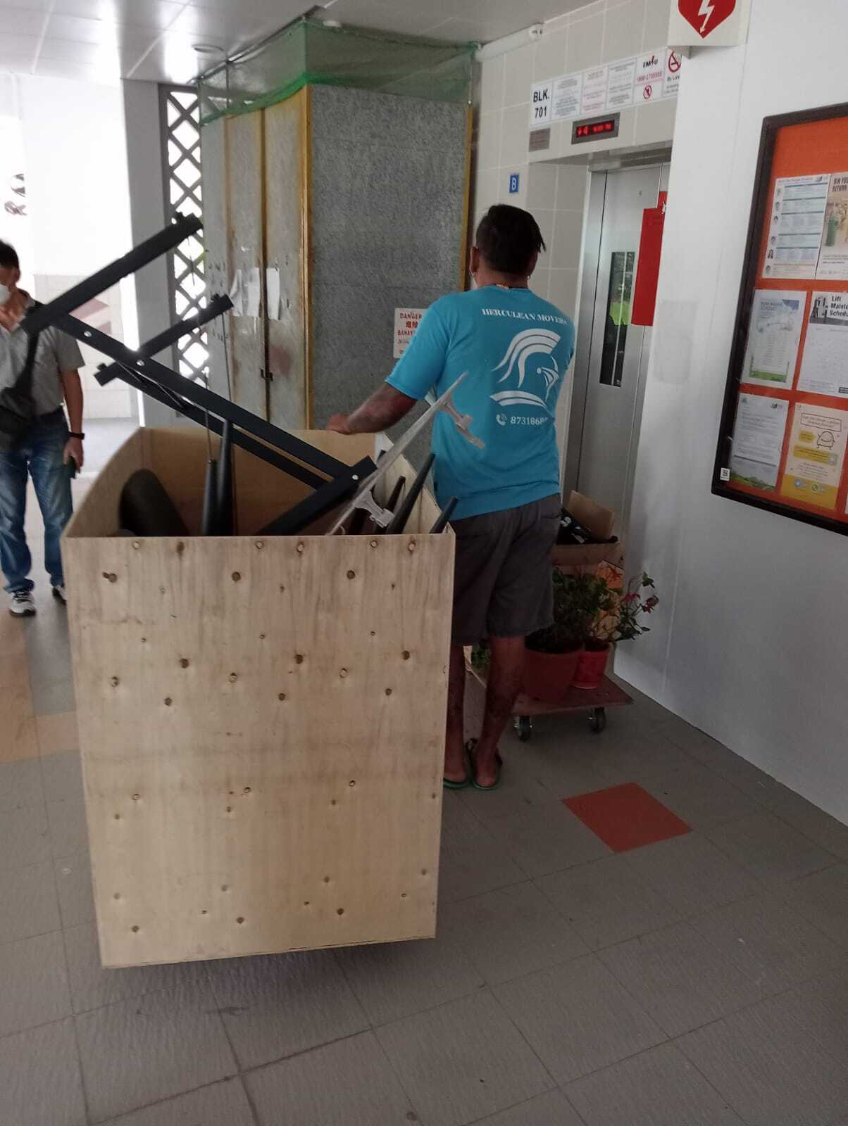 putting items into wooden box