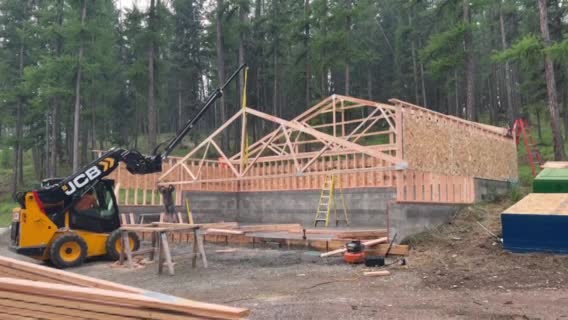 45'x25' storage building 4" slab 2' bar grid two 8'x10' overhead doors one exterior personal door