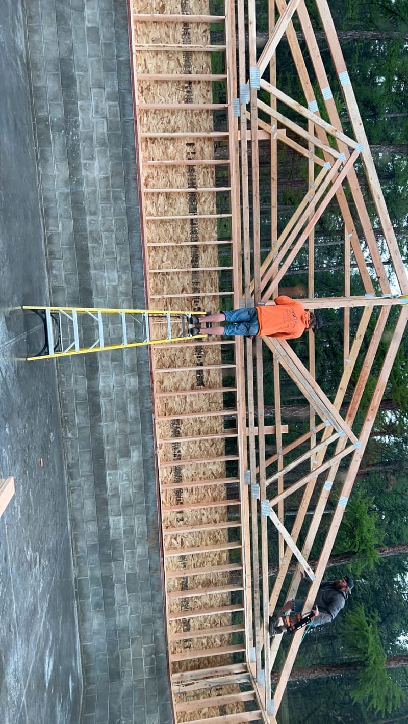 45'x25' storage building 4" slab 2' bar grid two 8'x10' overhead doors one exterior personal door