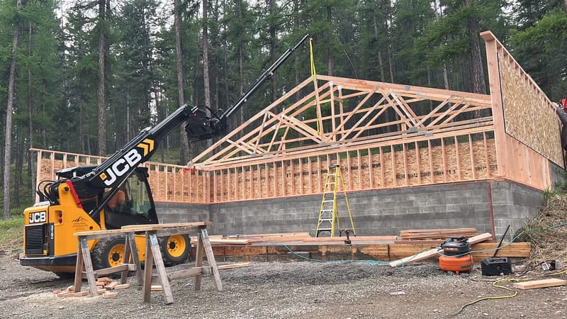 45'x25' storage building 4" slab 2' bar grid two 8'x10' overhead doors one exterior personal door