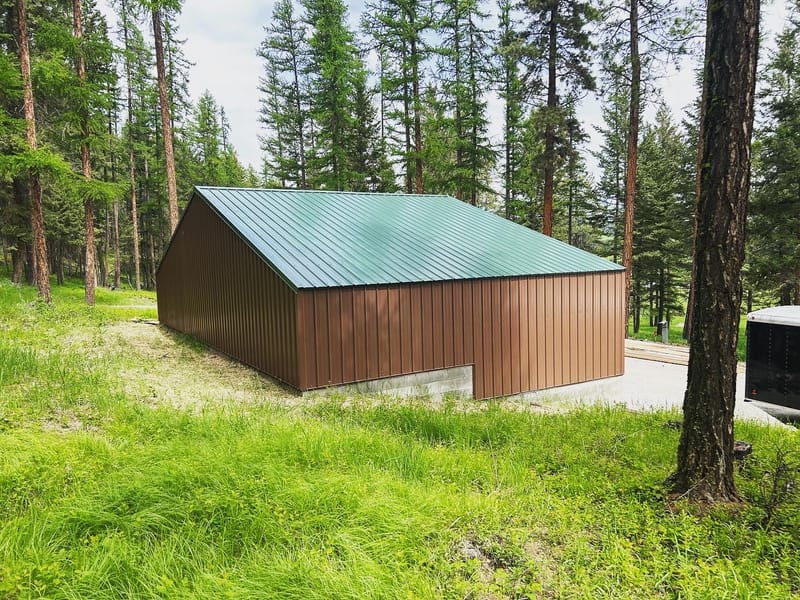 45'x25' storage building 4" slab 2' bar grid two 8'x10' overhead doors one exterior personal door