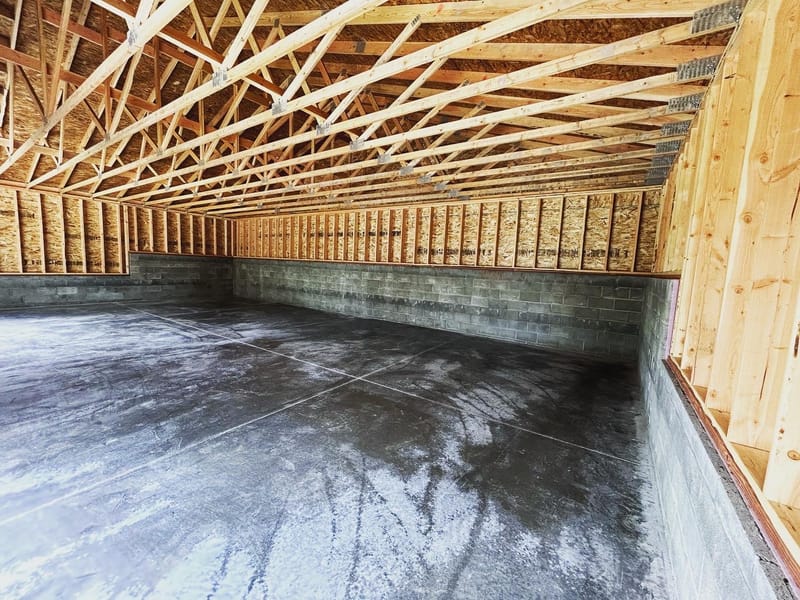 45'x25' storage building 4" slab 2' bar grid two 8'x10' overhead doors one exterior personal door