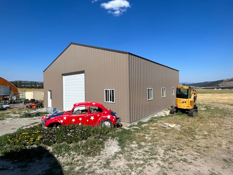 40'x40' 14' ceiling 6" slab with monolithic foundation 2' bar grid 12x12 overhead door exterior personal door