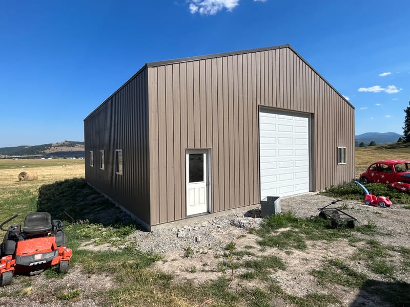 40'x40' 14' ceiling 6" slab with monolithic foundation 2' bar grid 12x12 overhead door exterior personal door