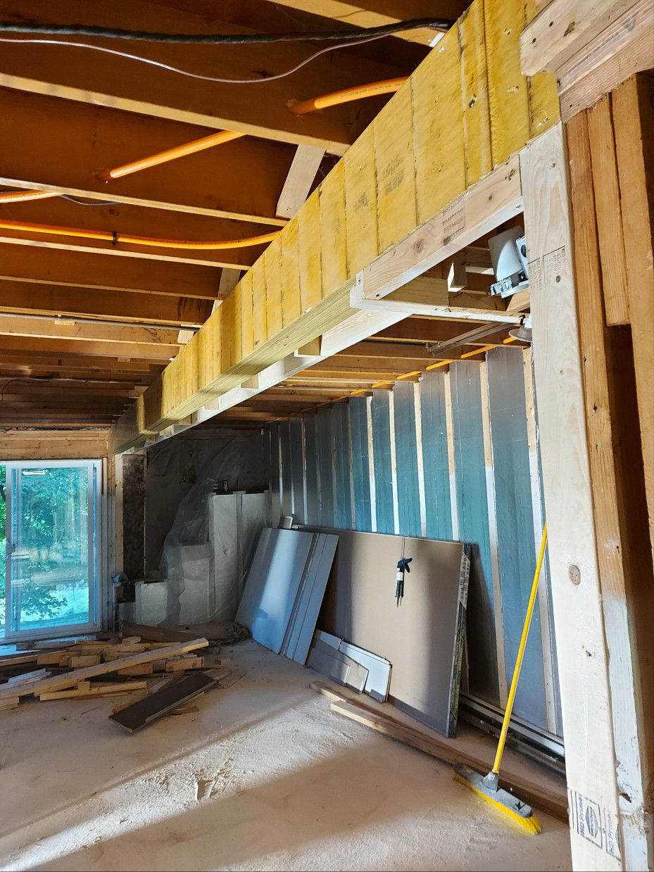 Installing load bearing beam