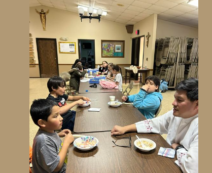 Father Hanz and our Faith Formation Students enjoying ice cream!