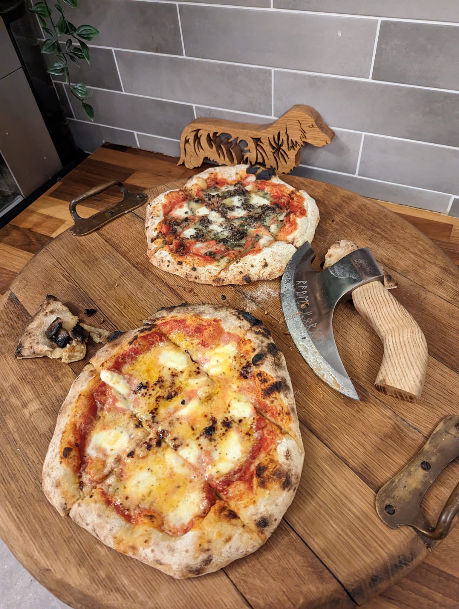 Pizza board made from whisky barrel top