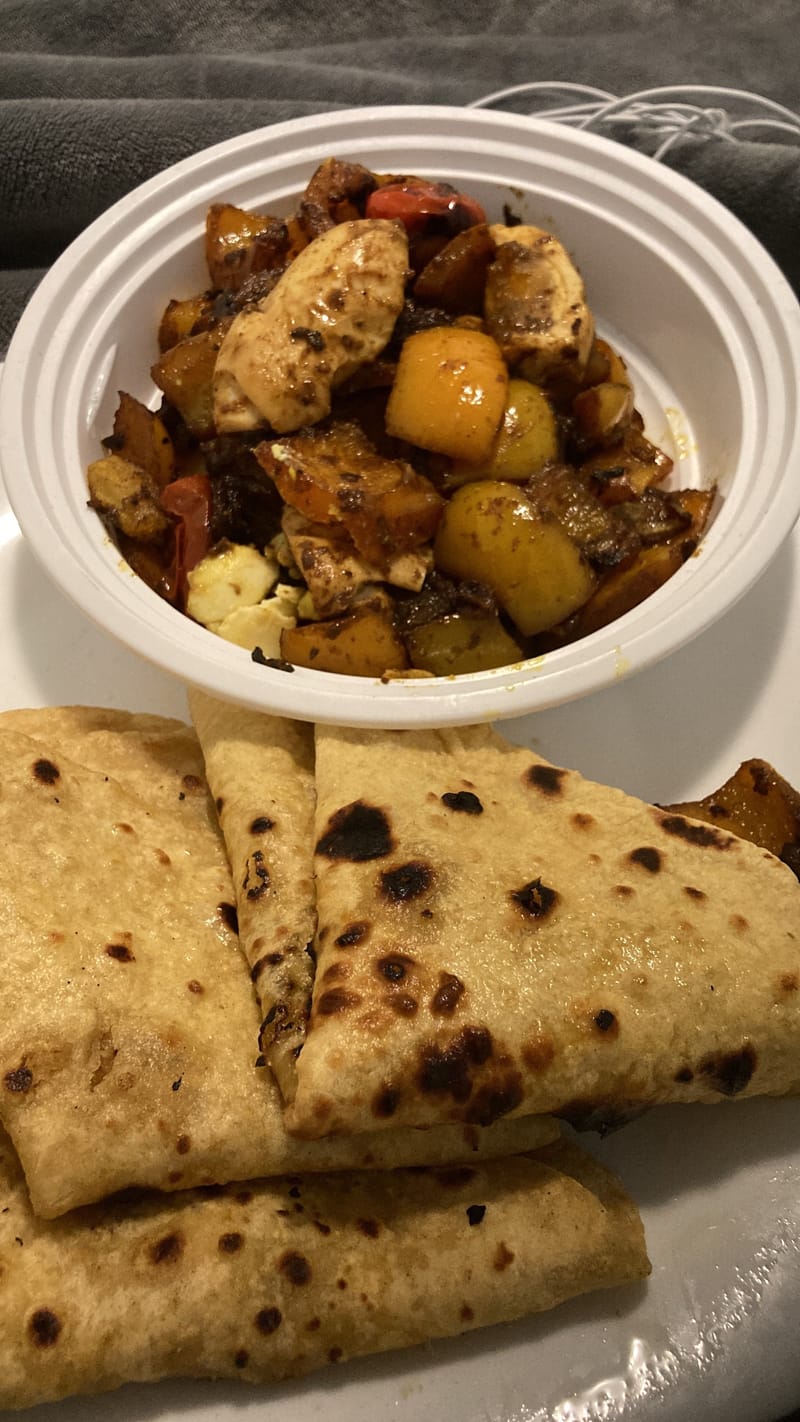 Spicy egg stew with rumali roti