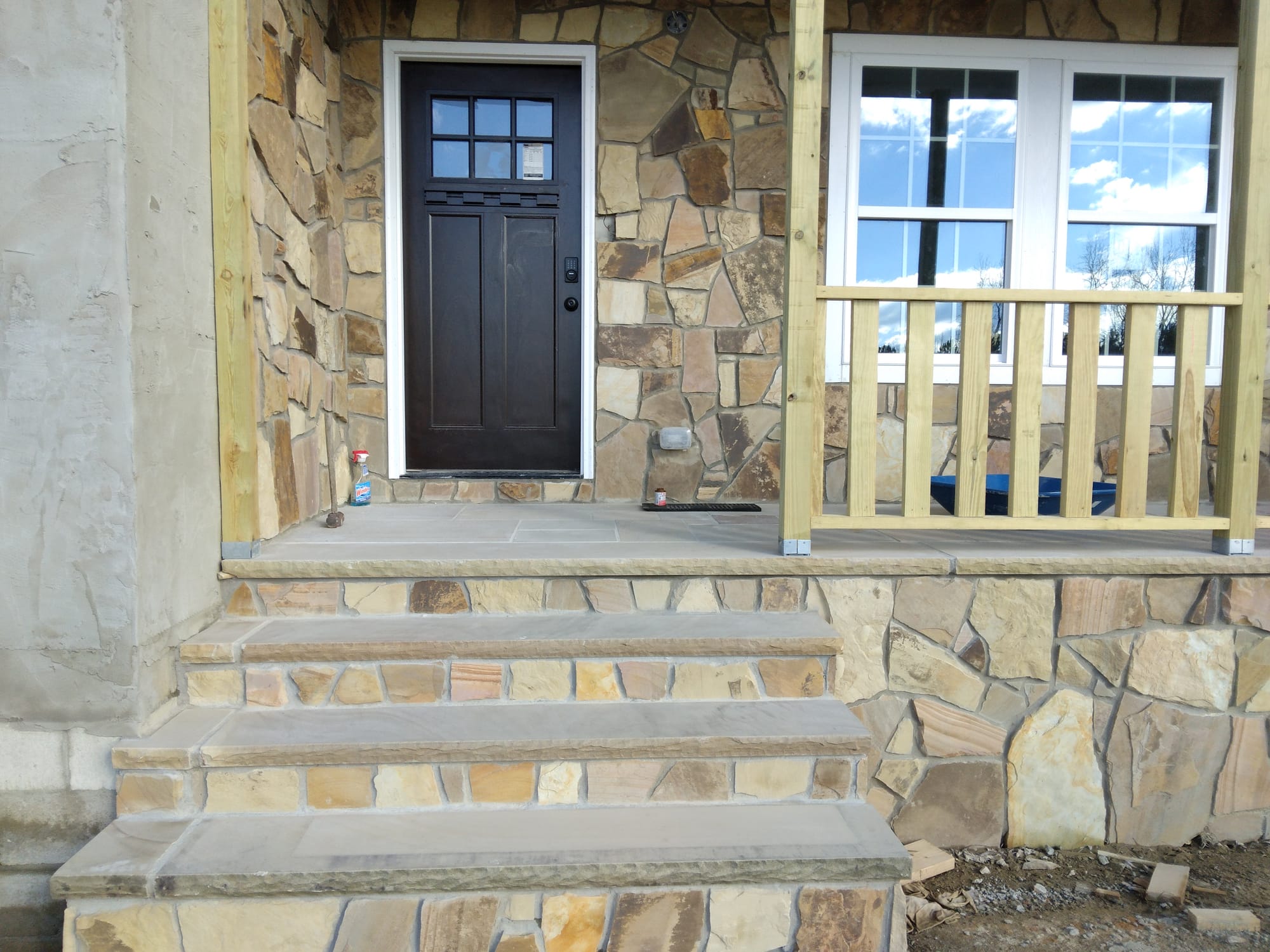 Front Porch - This is the front porch decorated in the beautiful Ten Crab Orchard stone and set to perfection.