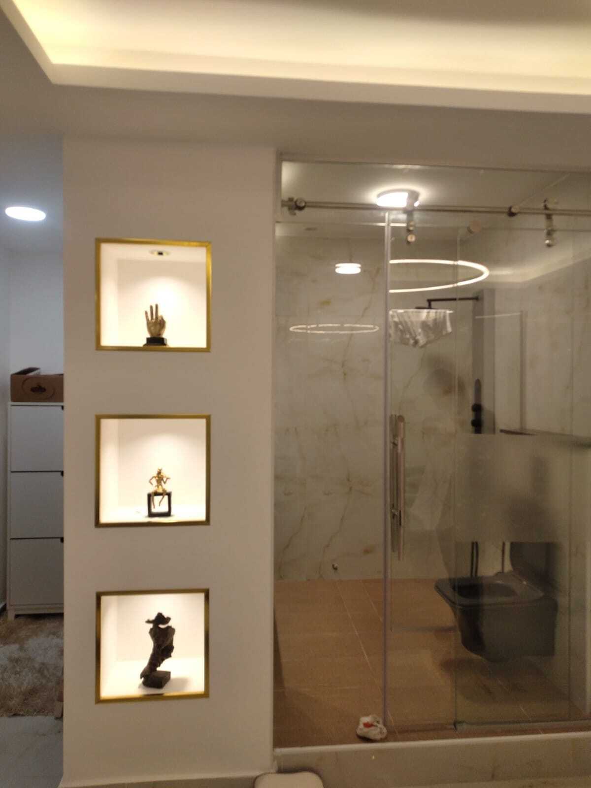 "استمتع بتحفة الفن في كل ركن من أركان حمامك مع تصميماتنا الرائعة." ديكورات حمامات المودرن و اكسسواراتها .