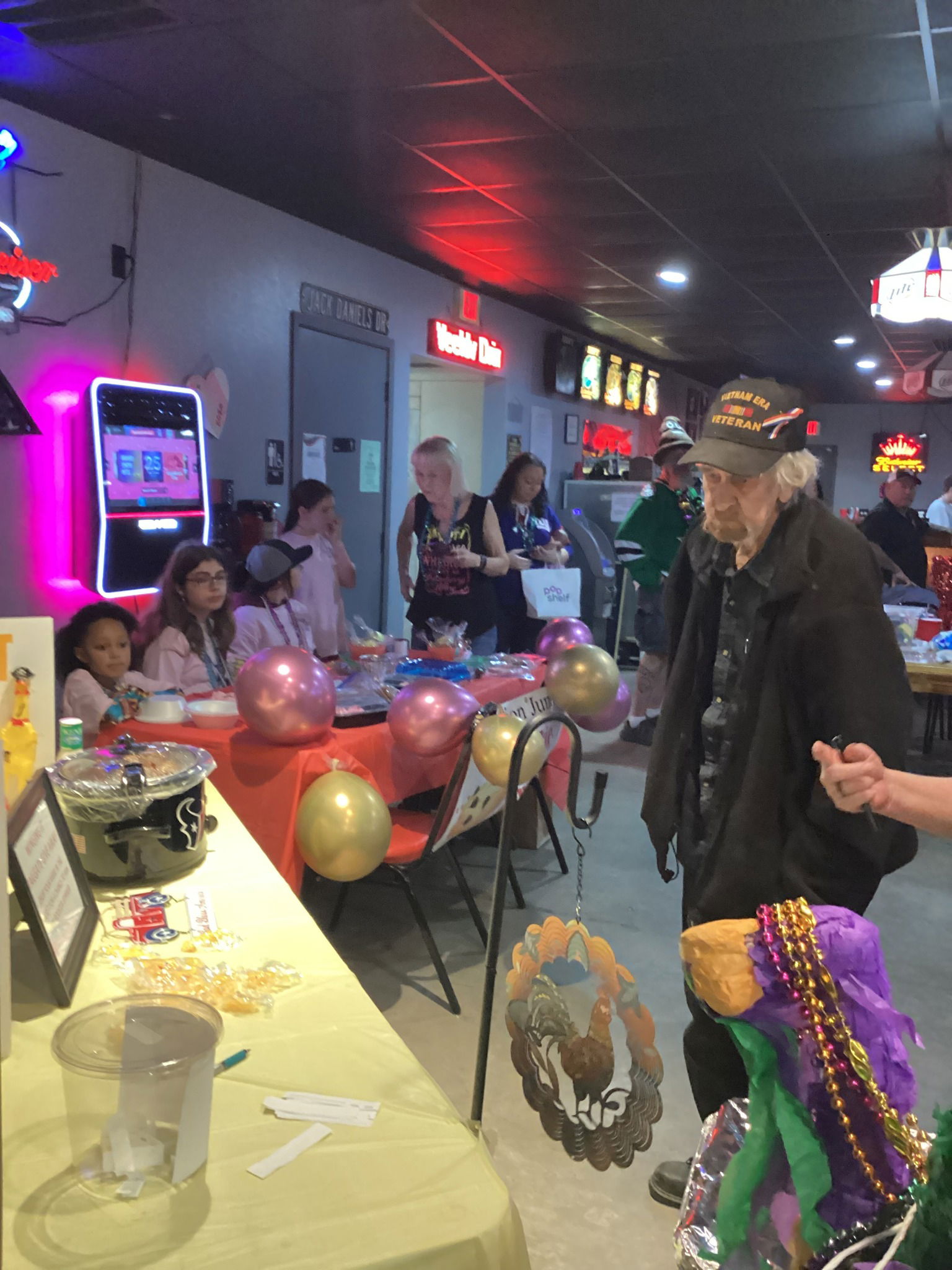 Judge Bob with the Juniors Bake Sale and Tammy's Winging It table