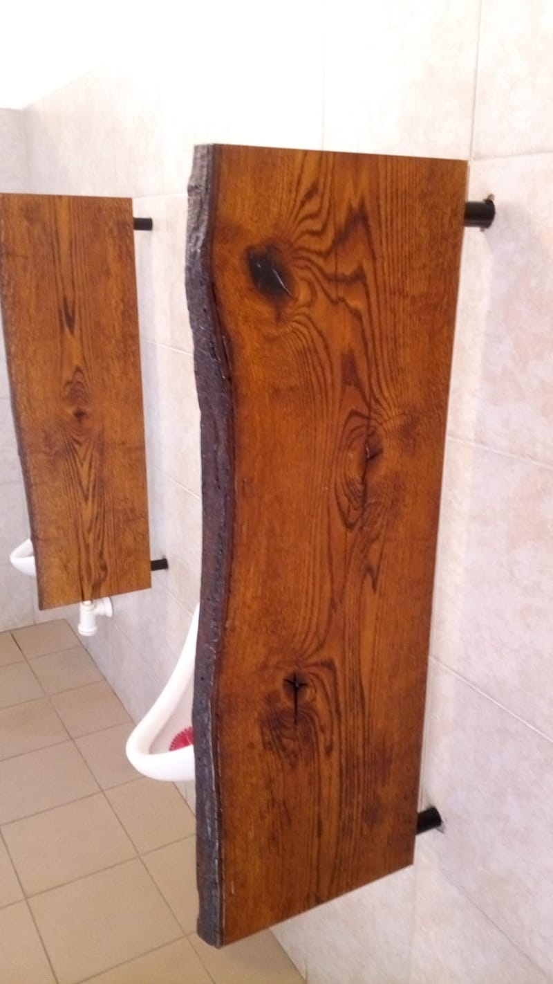 Přepážky k pisoárům