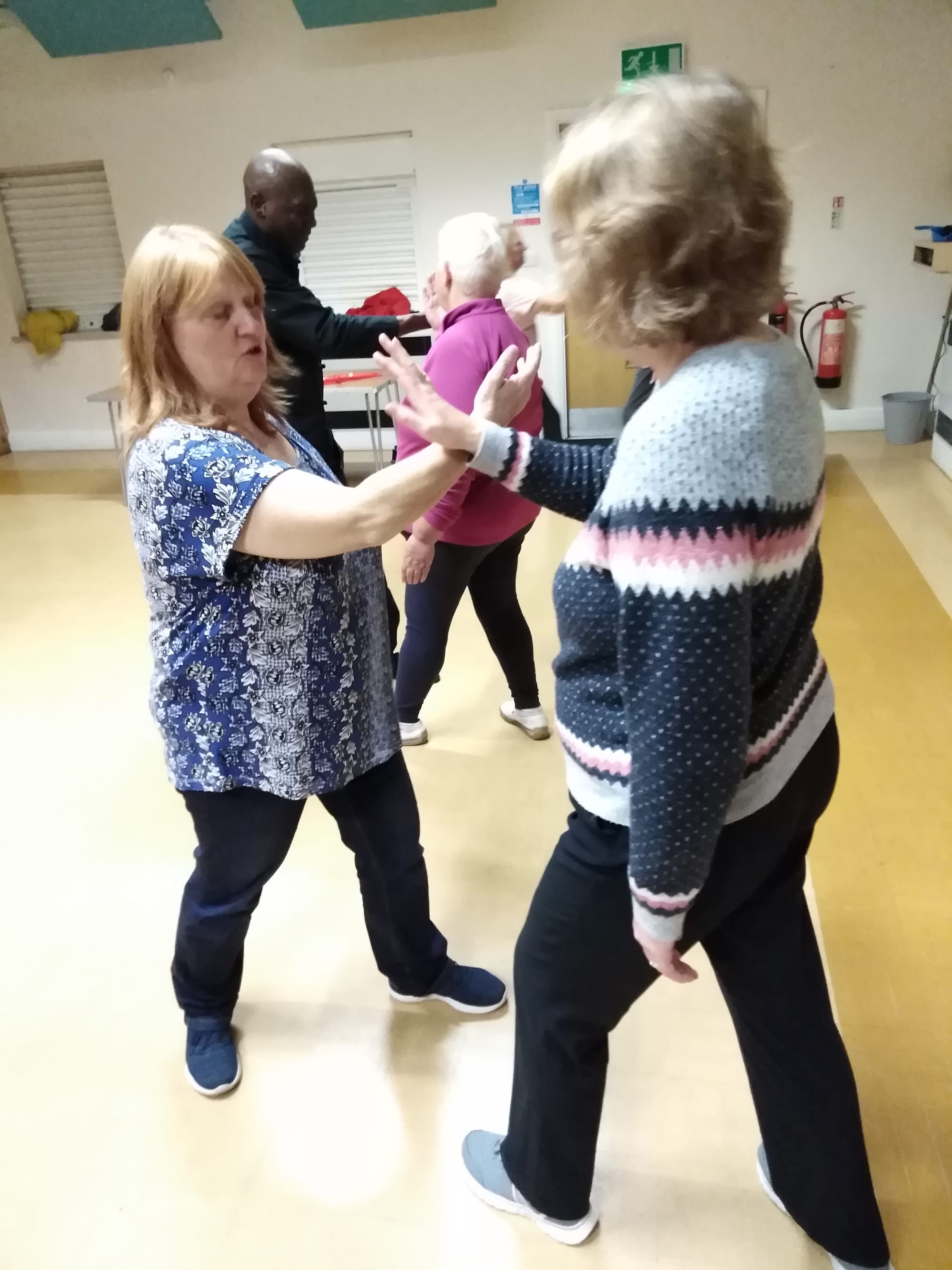 Stevie and Margaret practice some pushing hands