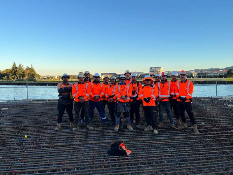 The fabricating, placing and fixing of Pile Plugs, Head Stocks, Capping Beams, Retaining walls and Deck Slabs.