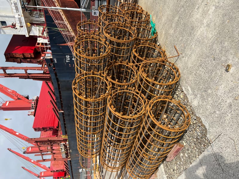 The fabricating, placing and fixing of Pile Plugs, Head Stocks, Capping Beams, Retaining walls and Deck Slabs.