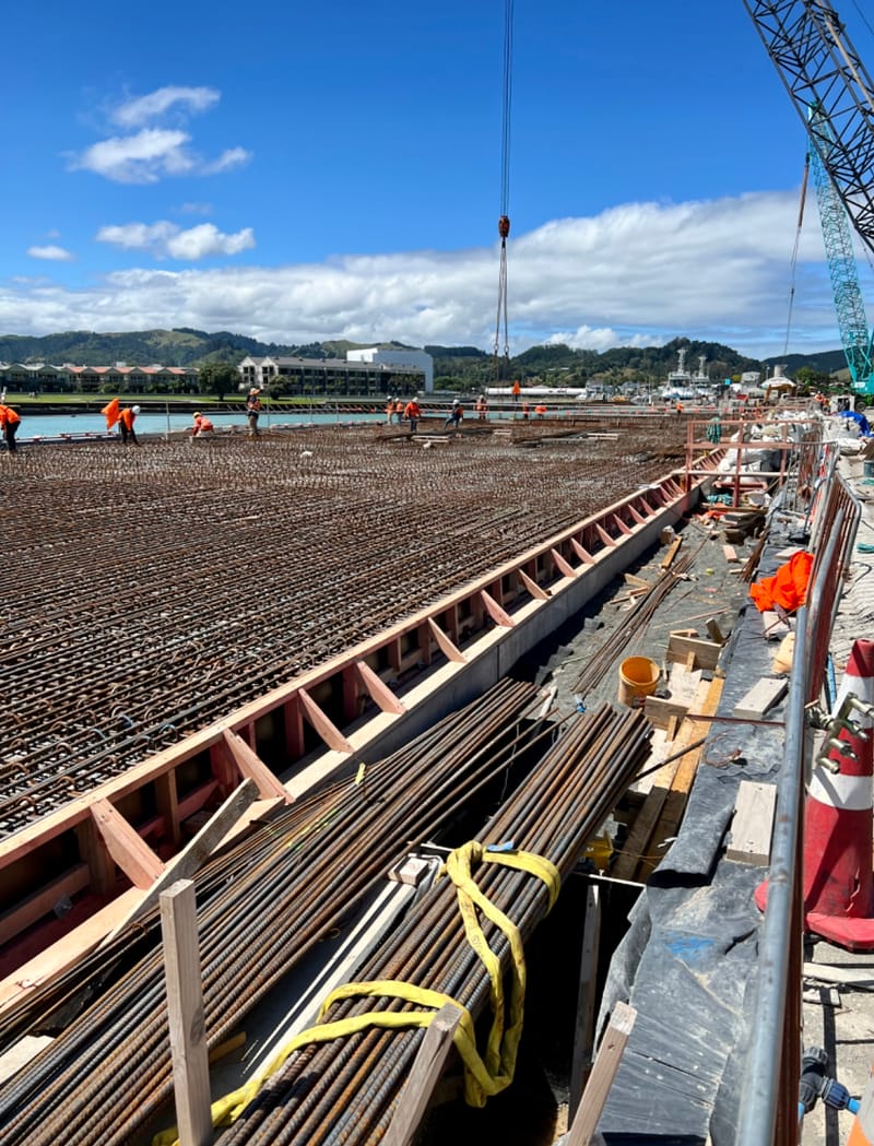 The fabricating, placing and fixing of Pile Plugs, Head Stocks, Capping Beams, Retaining walls and Deck Slabs.