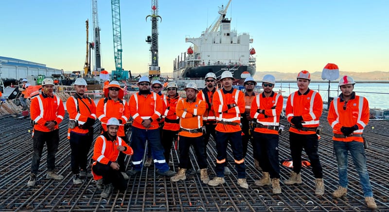 The fabricating, placing and fixing of Pile Plugs, Head Stocks, Capping Beams, Retaining walls and Deck Slabs.