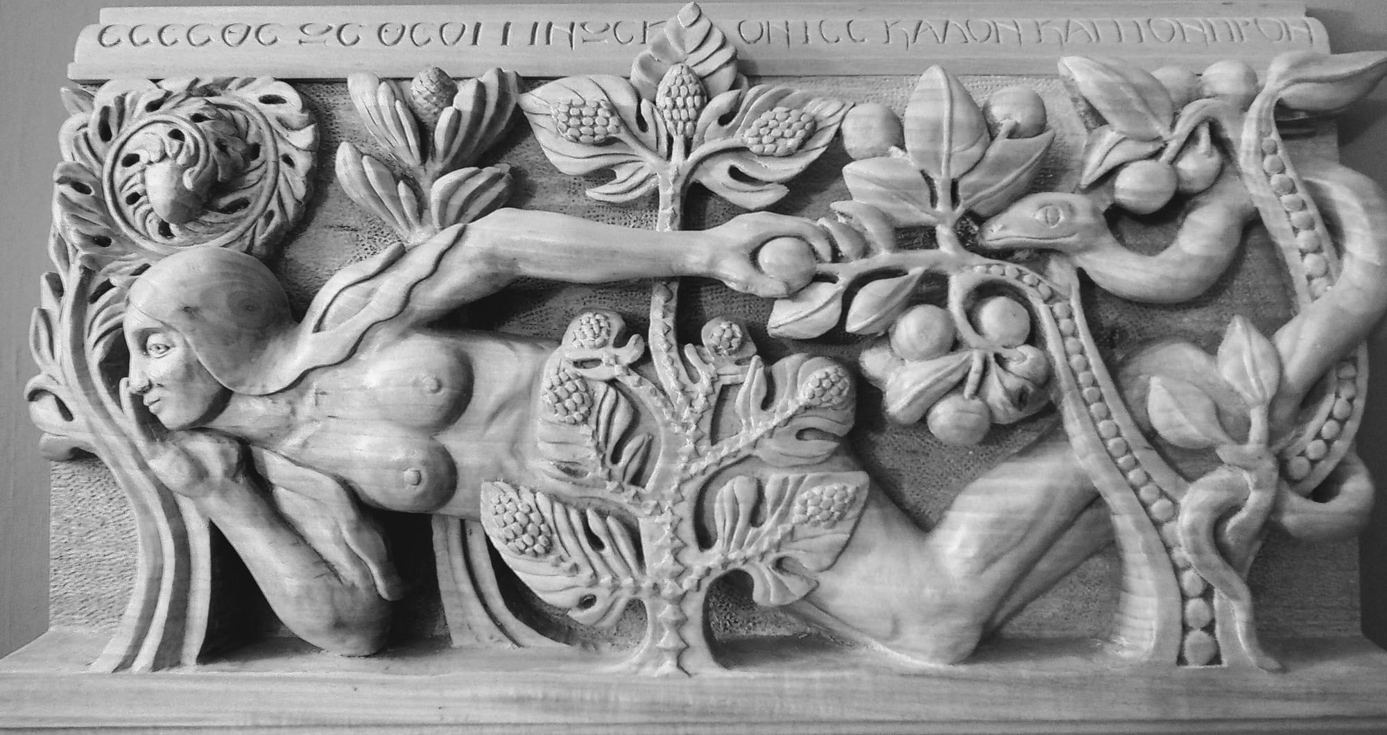  Eve takes the apple.