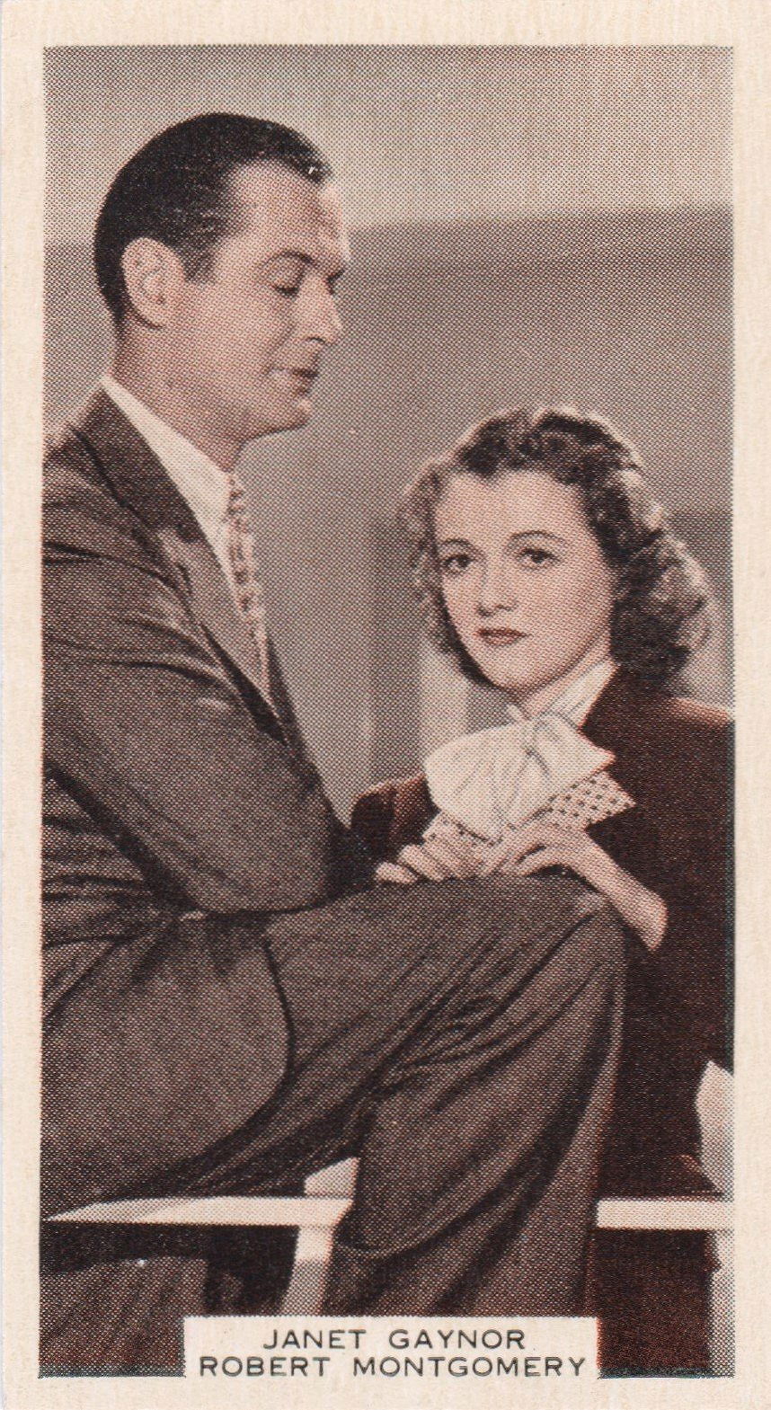 JANET GAYNOR AND ROBERT MONTGOMERY in "THREE LOVES HAS NANCY"