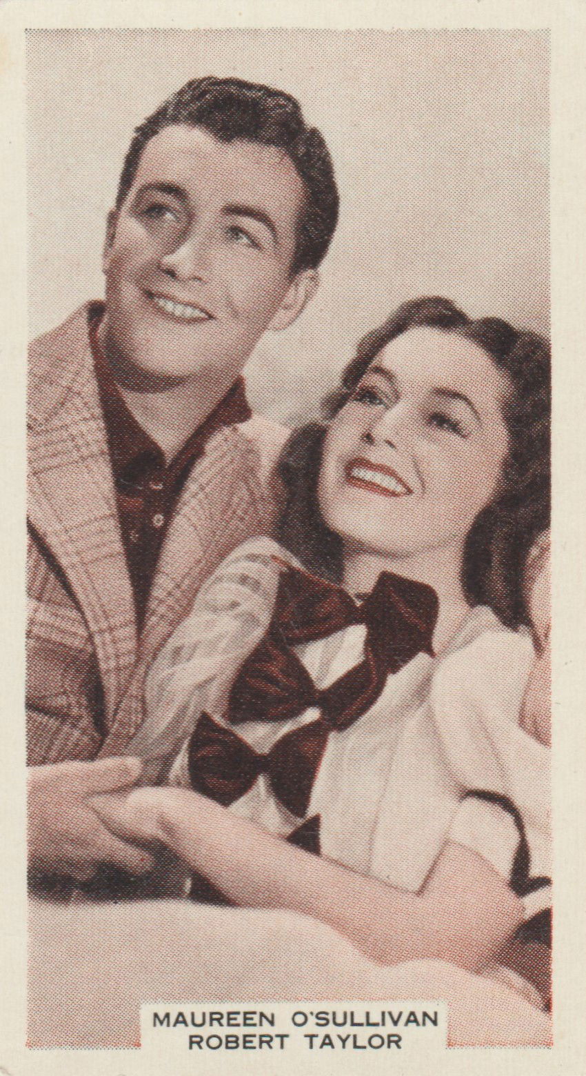 MAUREEN O'SULLIVAN AND ROBERT TAYLOR in "THE CROWD ROARS"
